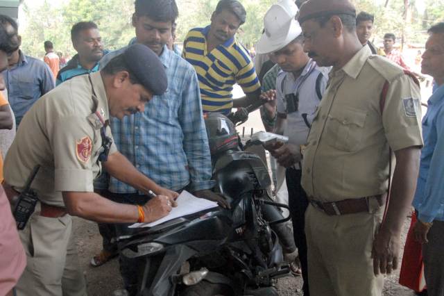 documents while riding bike in bhubaneswar