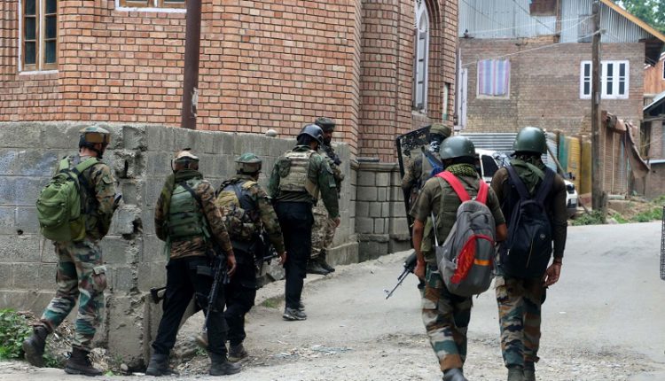 Kulgam: Security personnel carry out cordon and search operations after one terrorist was killed in an encounter at South Kashmir's Kulgam district on July 4, 2020. The encounter started after security forces got an input about the presence of terrorists in Arrah area of Kulgam. (hoto: IANS)