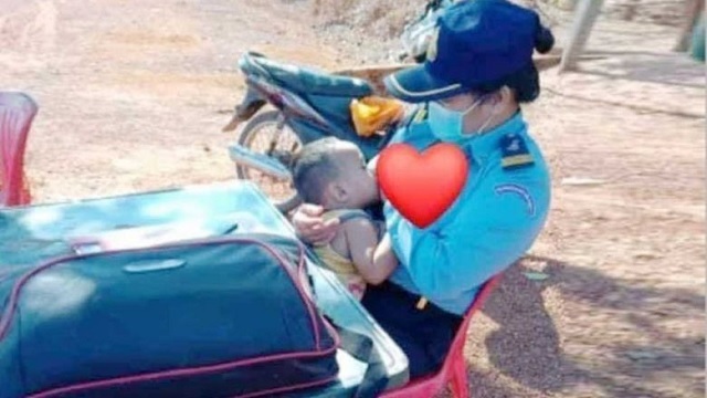cambodia lady officer breastfeeding