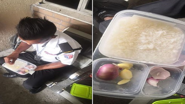 malaysian security guard having rice with onions and garlic
