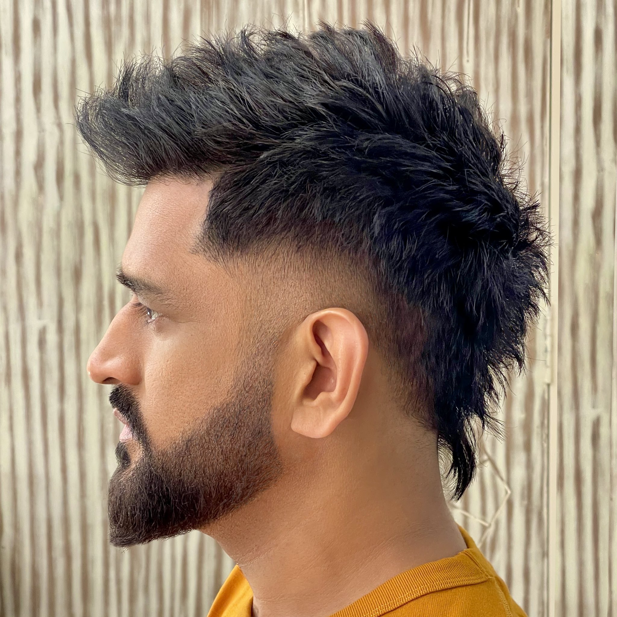 Dhoni’s new hairstyle surprise fans