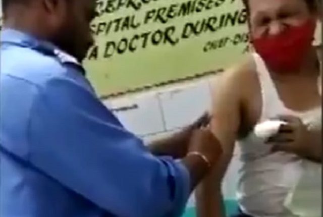 security guard gives injection