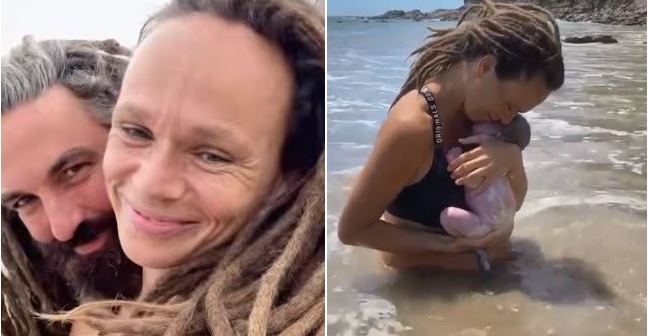 Woman gives birth baby in ocean