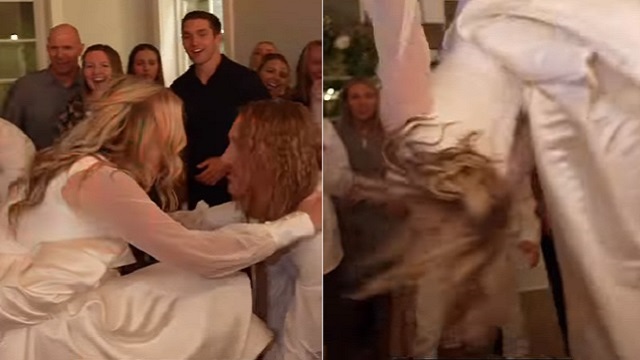 woman does backflip in wedding dress