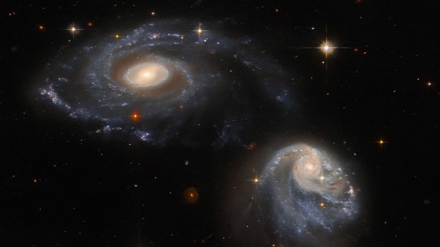 hubble captures interacting galaxies
