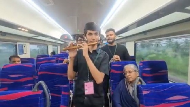 student plays flute on train