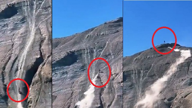 Video of man riding bike on steep hill