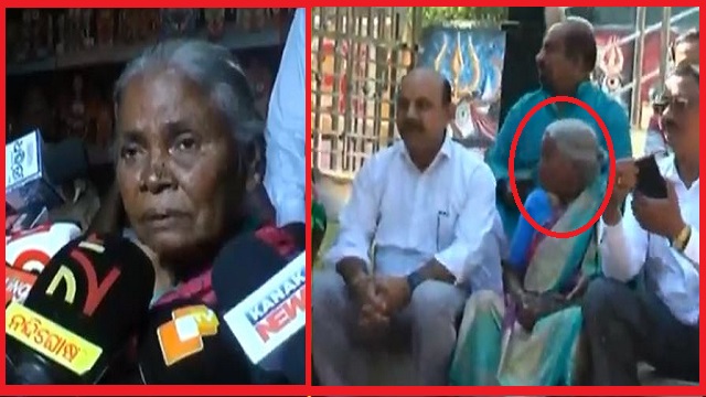 woman beggar donates money