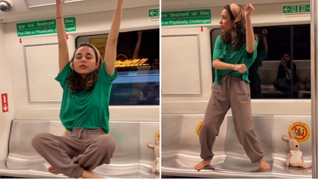 girl dances on empty metro coach