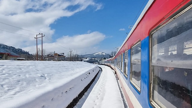 snow capped railway track