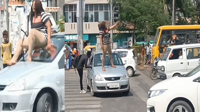 drunk woman dancing on car in gwalior