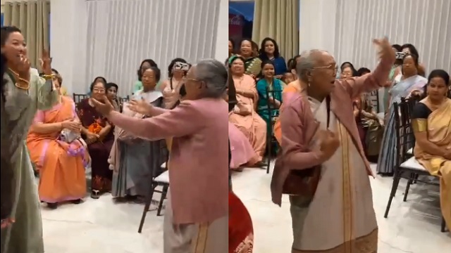 Elderly woman dancing to bollywood song