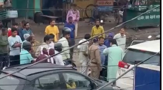 Uttarakhand minister thrashing man