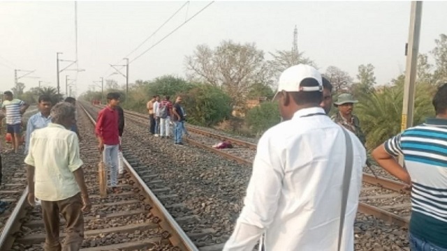 UP man forces son to sit on tracks
