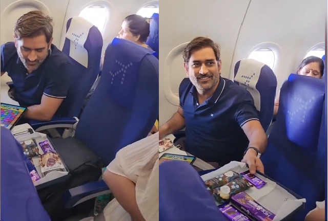 Air hostess offers chocolates to MS Dhoni