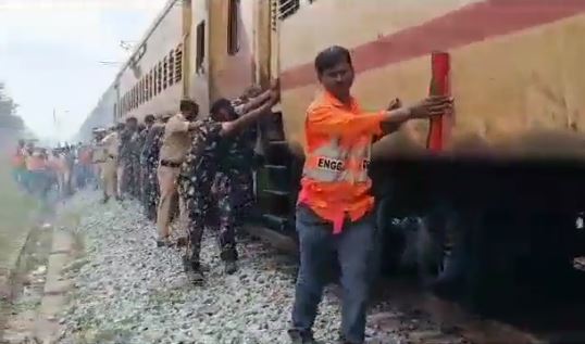 Army jawans push train