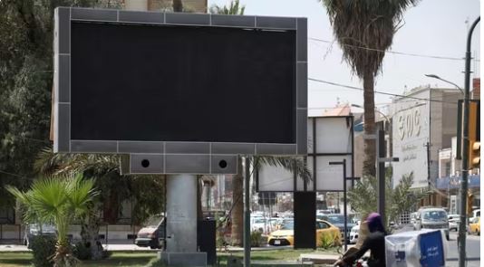 advt boards switched off in Baghdad