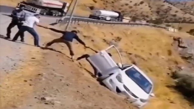 Man gets trapped in car